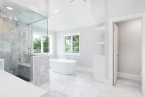 soaking-tub-and-walk-in-shower-in-white-marble-bathroom